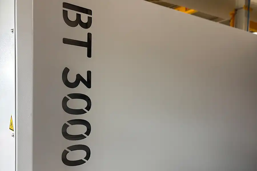 Close-up of BT 3000 CNC milling machine showing model designation and high-quality housing finish